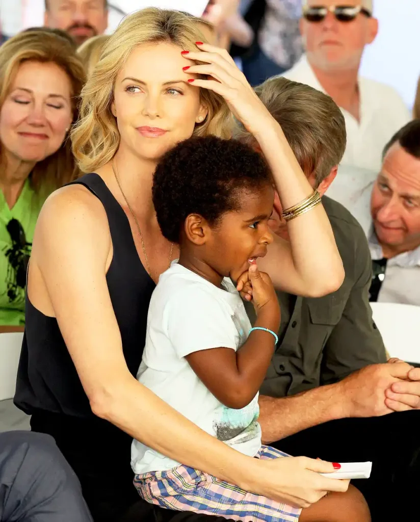 Charlize with her daughters